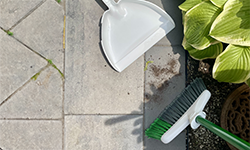 Precision Angle Broom and Dustpan on floor