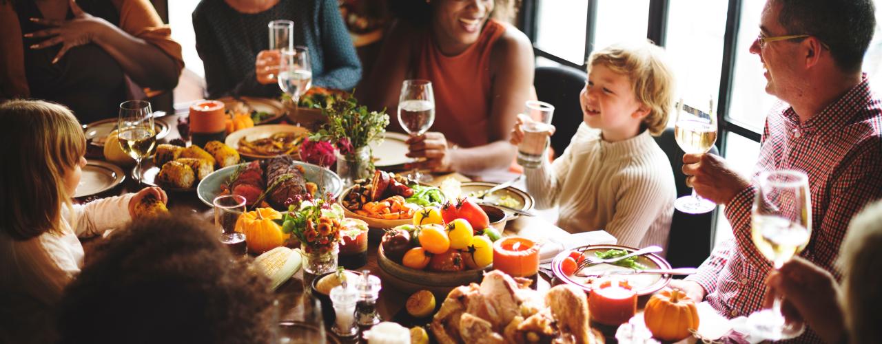 Family having Thanksgiving dinner together